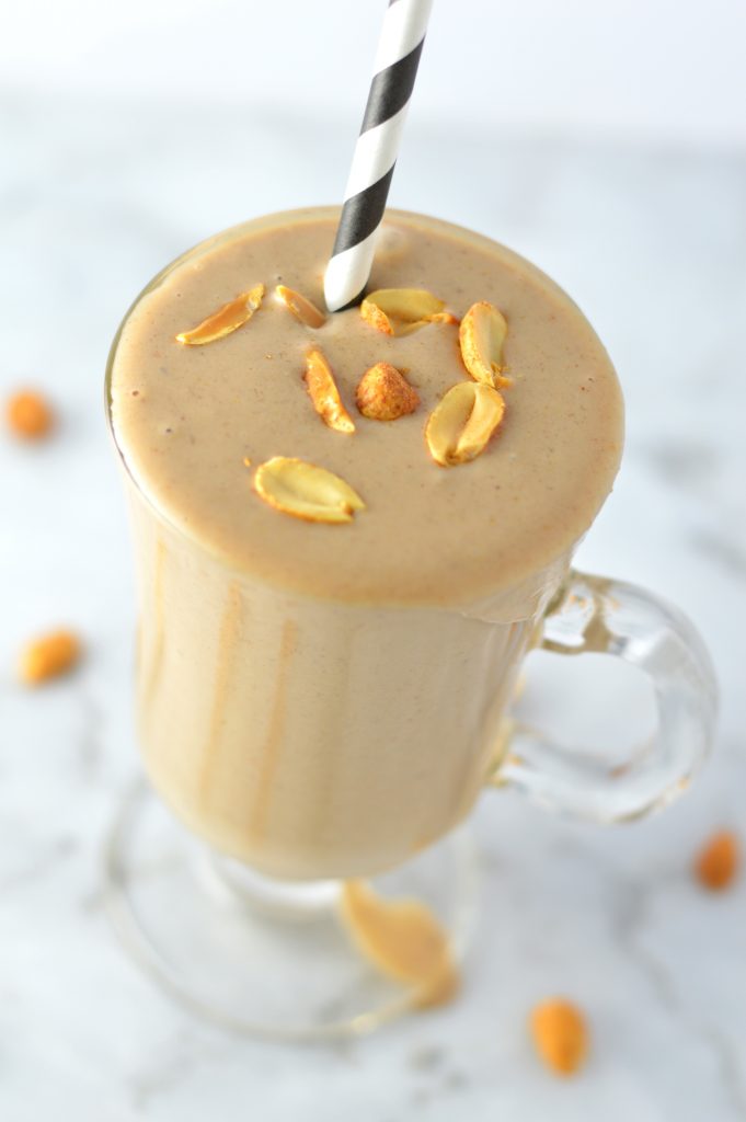 Healthy Chocolate Peanut Butter Banana Smoothie made with protein powder. Tastes like ice cream, it is perfect for breakfast or as a post workout snack