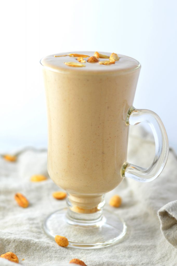 Healthy Chocolate Peanut Butter Banana Smoothie made with protein powder. Tastes like ice cream, it is perfect for breakfast or as a post workout snack