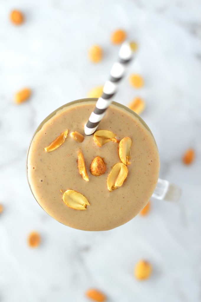 Healthy Chocolate Peanut Butter Banana Smoothie made with protein powder. Tastes like ice cream, it is perfect for breakfast or as a post workout snack