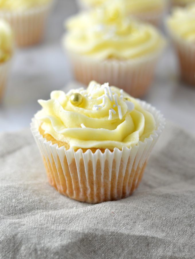 Easy Eggnog Cupcakes with eggnog buttercream recipe. The perfect dessert idea to use up your leftover eggnog over the holidays.