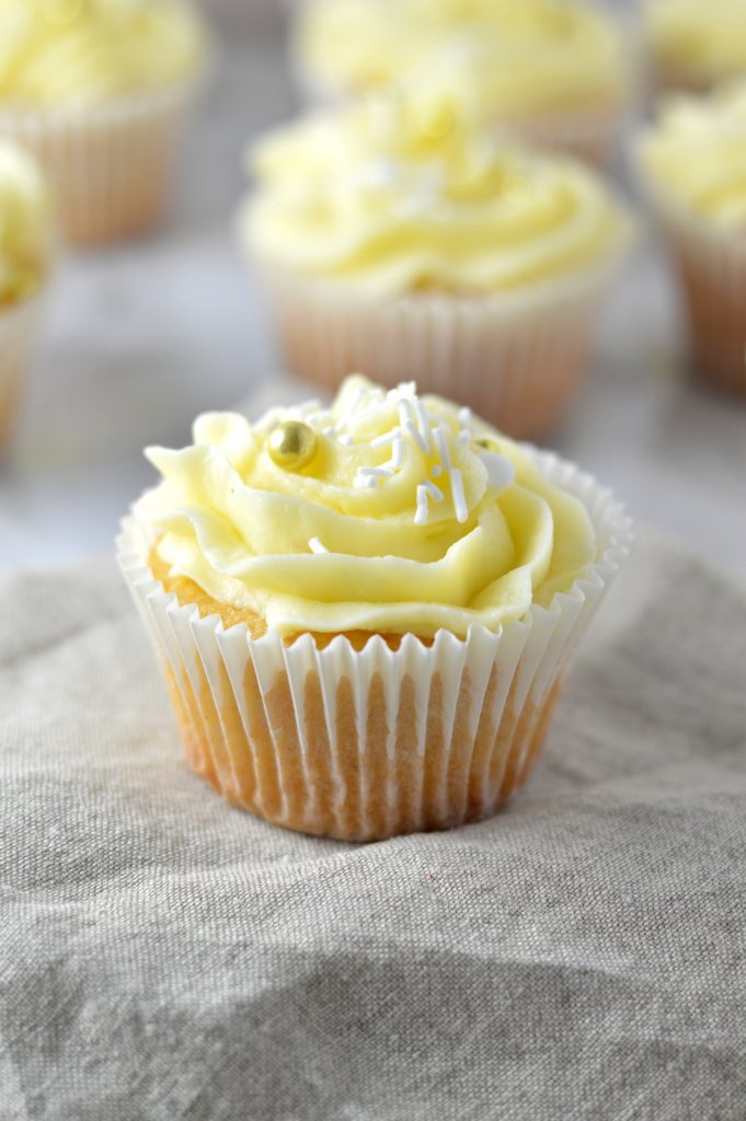 Easy Eggnog Cupcakes with eggnog buttercream recipe. The perfect dessert idea to use up your leftover eggnog over the holidays.