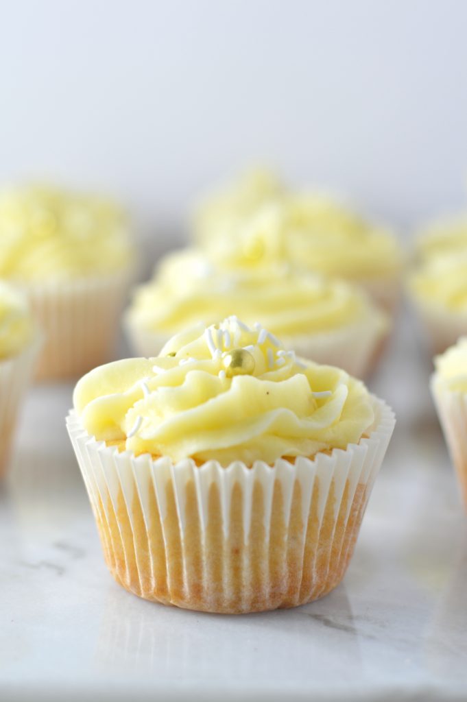 Easy Eggnog Cupcakes with eggnog buttercream recipe. The perfect dessert idea to use up your leftover eggnog over the holidays.