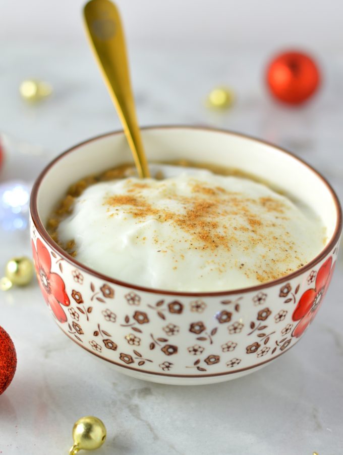 Easy Eggnog Latte Oatmeal recipe. Made with strong coffee and rich eggnog, this is the perfect breakfast idea for the holidays!