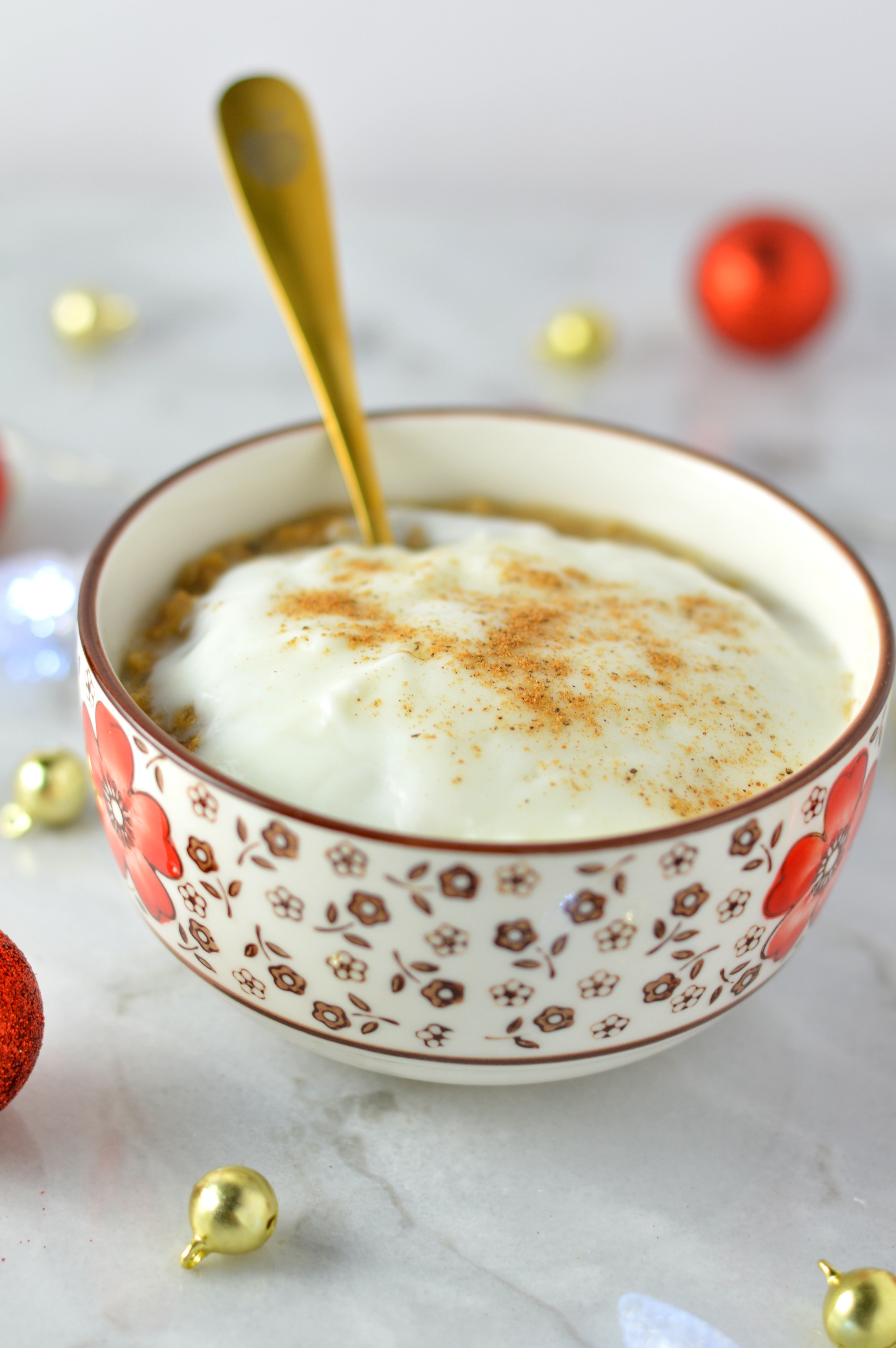 Easy Eggnog Latte Oatmeal recipe. Made with strong coffee and rich eggnog, this is the perfect breakfast idea for the holidays!