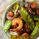 Easy Shrimp Stir Fry recipe with homemade honey garlic sauce. My go-to dinner idea when I have snow peas and shrimps in the fridge.