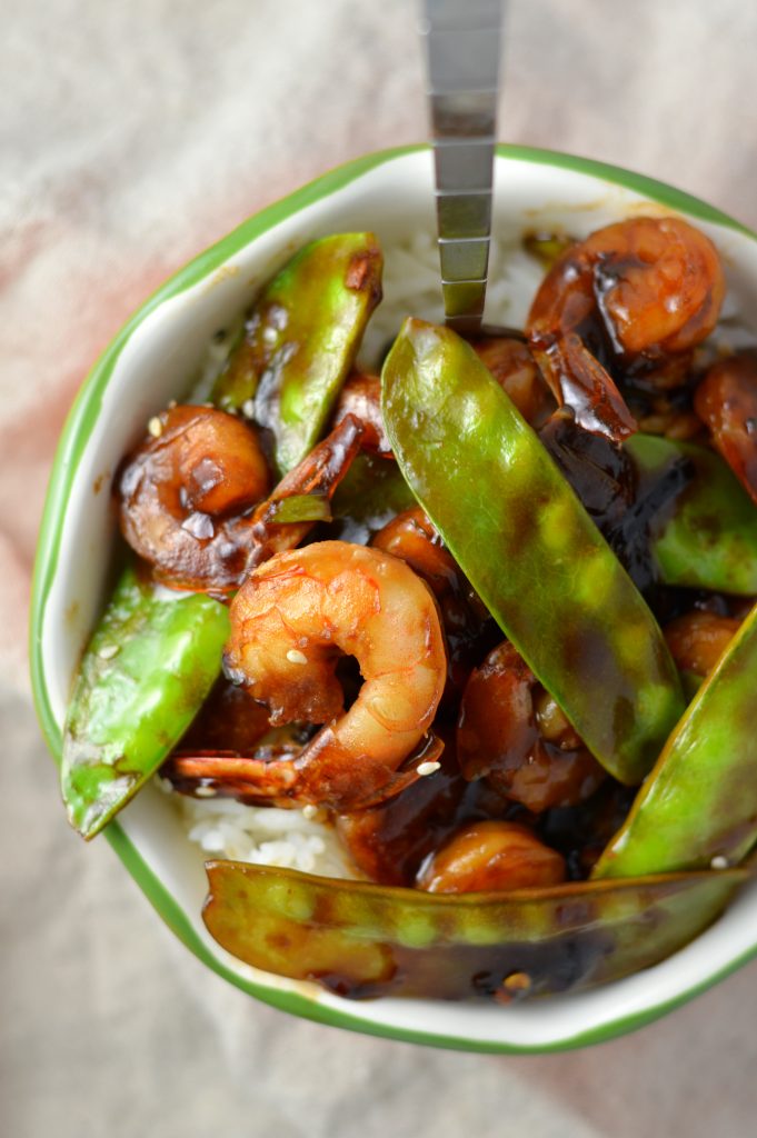 Easy Shrimp Stir Fry recipe with homemade honey garlic sauce. My go-to dinner idea when I have snow peas and shrimps in the fridge.