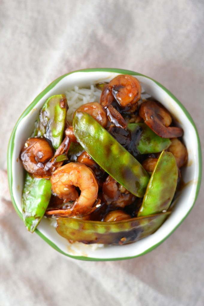 Easy Shrimp Stir Fry recipe with homemade honey garlic sauce. My go-to dinner idea when I have snow peas and shrimps in the fridge.