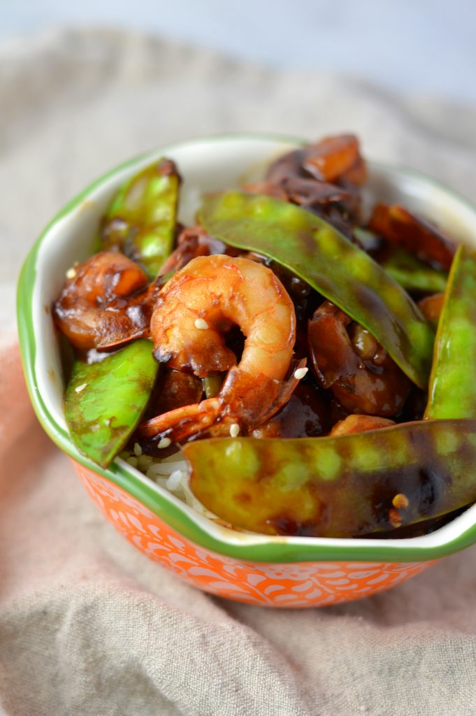 Easy Shrimp Stir Fry recipe with homemade honey garlic sauce. My go-to dinner idea when I have snow peas and shrimps in the fridge.