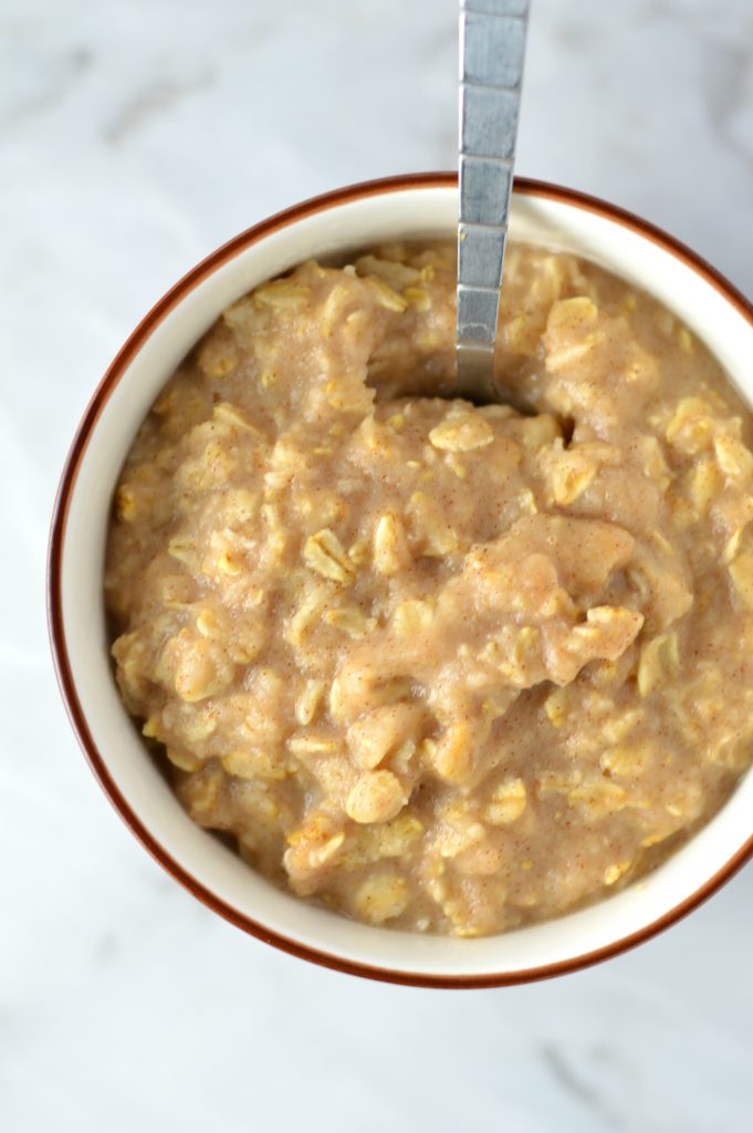 Easy Applesauce Oatmeal recipe. Perfect to use up leftover applesauce, this makes a quick and simple breakfast idea in only 4 ingredients.