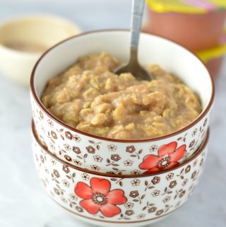 Easy Applesauce Oatmeal recipe. Perfect to use up leftover applesauce, this makes a quick and simple breakfast idea in only 4 ingredients.