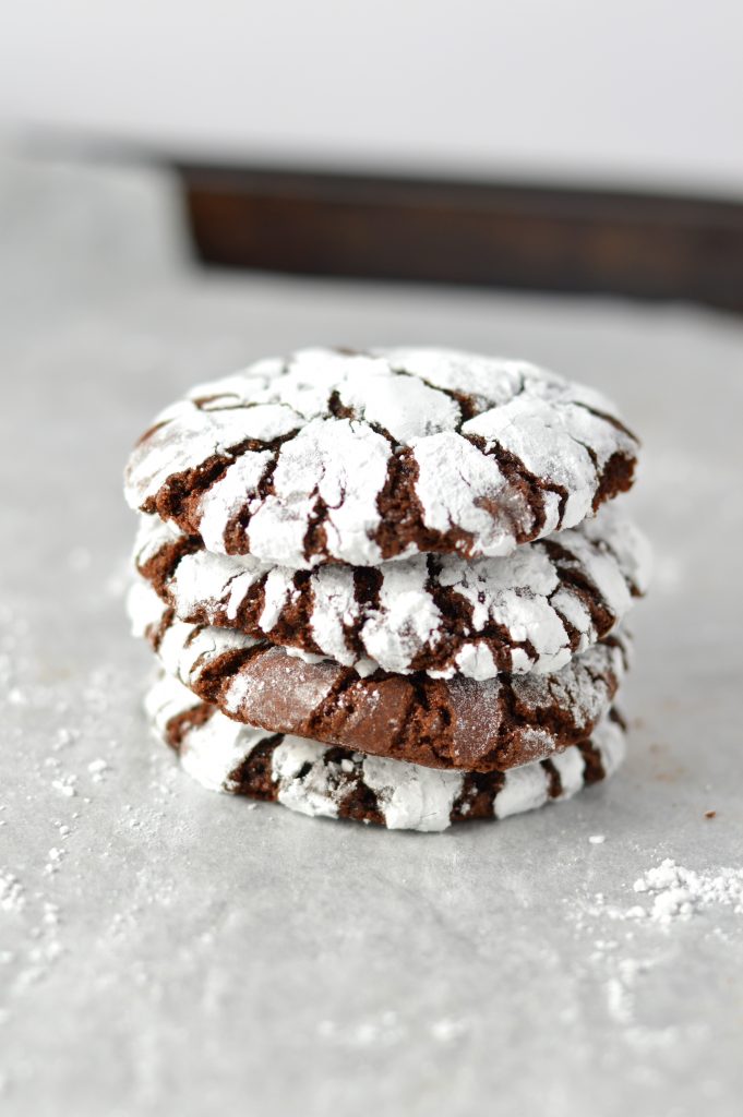 Easy Chocolate Crinkle Cookies recipe. Perfectly chewy and fudgy, these make a great dessert idea for the holidays or any time of the year.