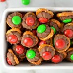 Easy Christmas Chocolate Pretzel Bites recipe. Made with only 3 ingredients, this is the perfect last minute dessert idea for the holidays.