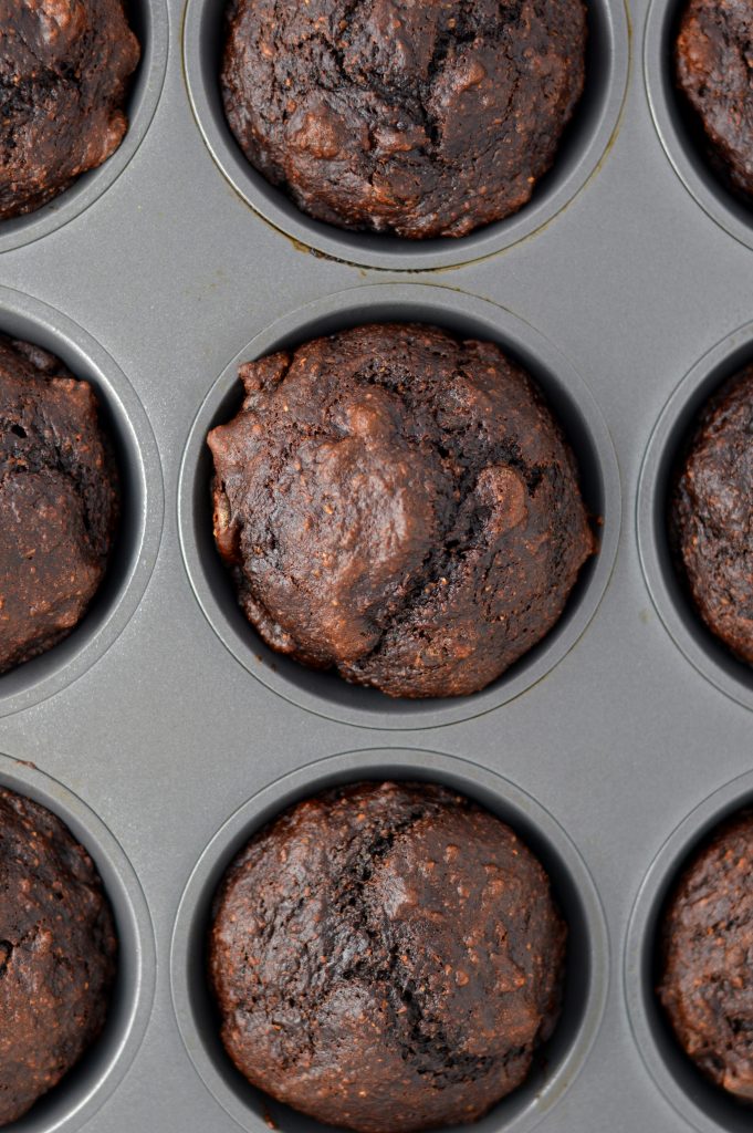 Easy and Healthy Double Chocolate Banana Muffins Recipe. Made with whole wheat flour and partly sweetened with applesauce, this makes a great nut-free snack