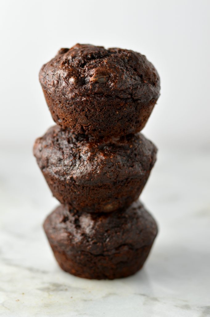 Easy and Healthy Double Chocolate Banana Muffins Recipe. Made with whole wheat flour and partly sweetened with applesauce, this makes a great nut-free snack