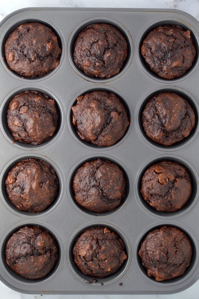 Easy and Healthy Double Chocolate Banana Muffins Recipe. Made with whole wheat flour and partly sweetened with applesauce, this makes a great nut-free snack