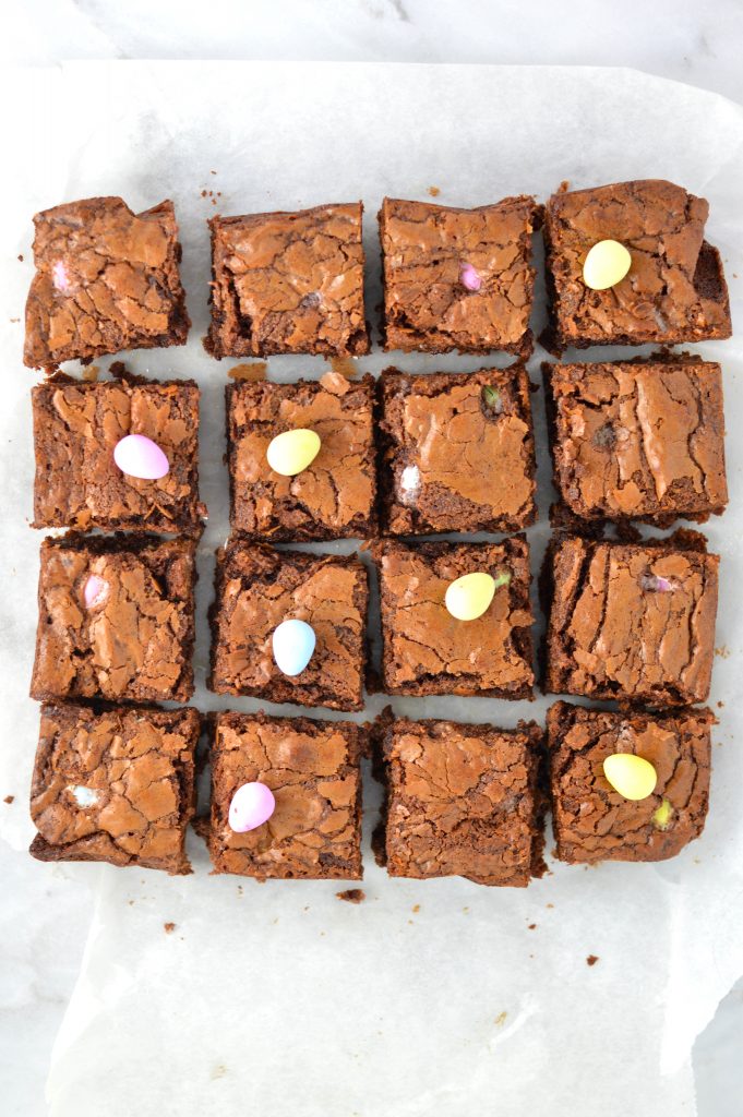 Easy Mini Egg Nutella Brownies Recipe. Chewy and rich, these brownies make a great dessert idea for Easter or anytime mini eggs are in season!