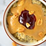 Healthy Peanut Butter and Jelly Oatmeal recipe. This porridge can be made vegan, it makes a great quick and easy breakfast idea.