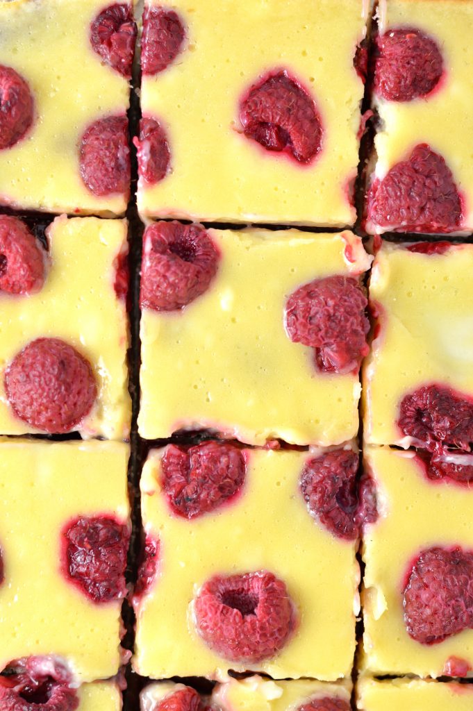 Easy Raspberry Cream Cheese Bars recipe. Made with fresh raspberries on top of a shortbread crust, tastes almost like cheesecake.