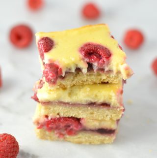 Easy Raspberry Cream Cheese Bars recipe. Made with fresh raspberries on top of a shortbread crust, tastes almost like cheesecake.