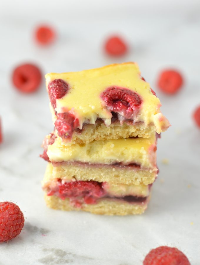 Easy Raspberry Cream Cheese Bars recipe. Made with fresh raspberries on top of a shortbread crust, tastes almost like cheesecake.