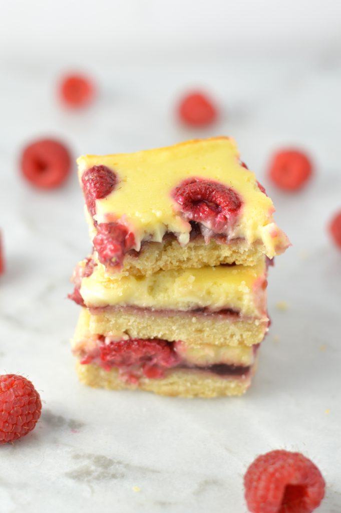 Easy Raspberry Cream Cheese Bars recipe. Made with fresh raspberries on top of a shortbread crust, tastes almost like cheesecake.