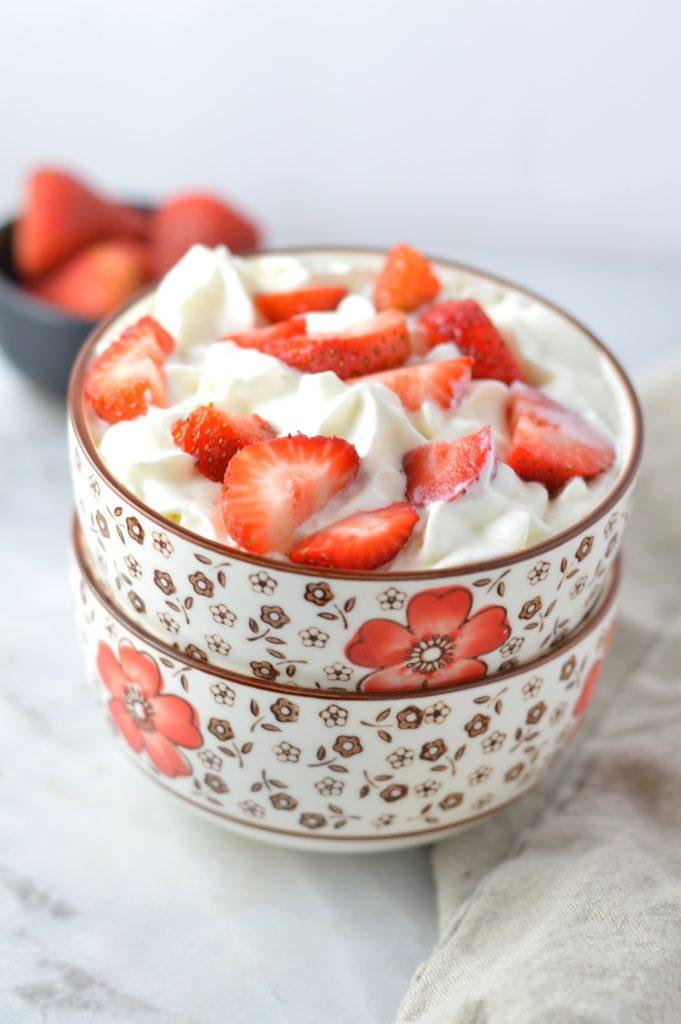 Easy Strawberry Shortcake Oatmeal recipe. This decadent breakfast idea is so good, you could even eat it for dessert! Whipped cream optional.