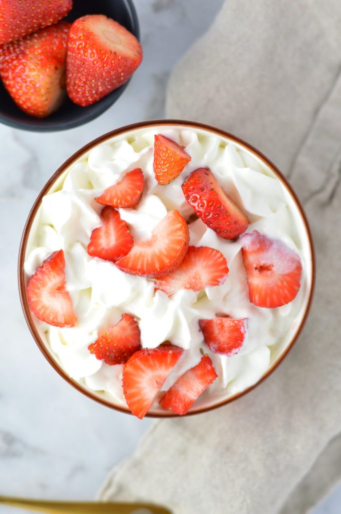 Easy Strawberry Shortcake Oatmeal recipe. This decadent breakfast idea is so good, you could even eat it for dessert! Whipped cream optional.