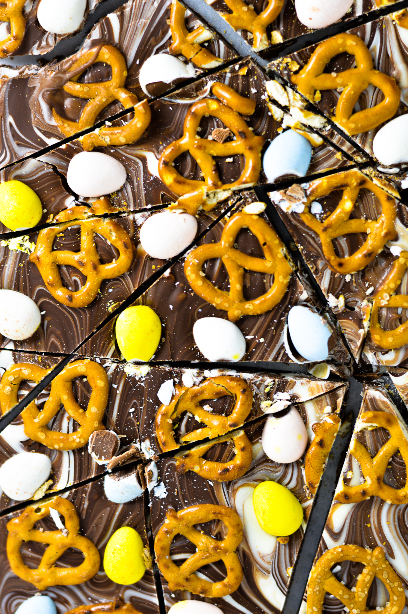 Sliced Chocllate Easter Bark with pretzels and mini eggs.