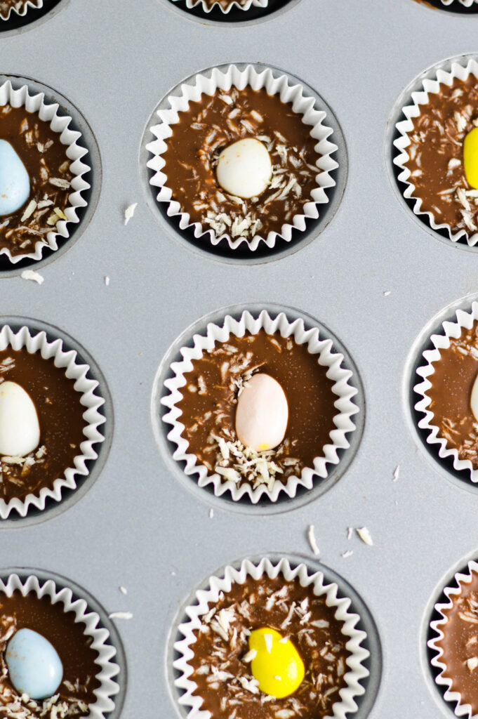 Mini Egg Coconut Nutella Cups in a mini muffin pan.