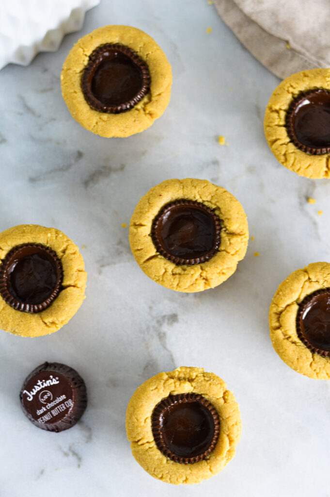 Overhead view of 6 Dark Chocolate Peanut Butter Cookie Cups.