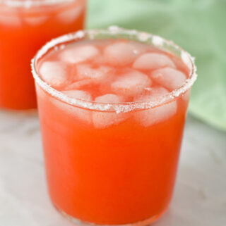 2 Watermelon Margaritas on a marble surface.