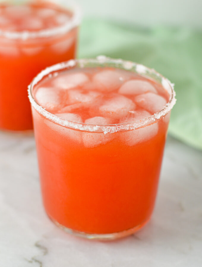 2 Watermelon Margaritas on a marble surface.