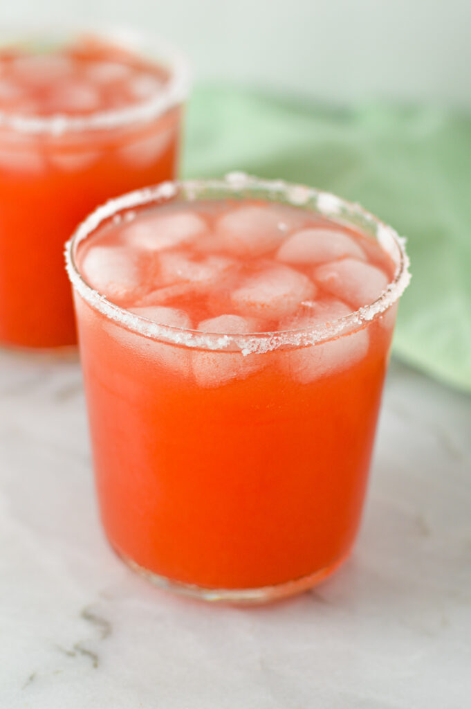 2 Watermelon Margaritas on a marble surface.