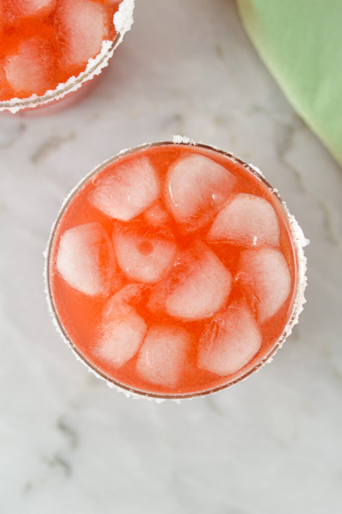 Overhead shot of Watermelon Margaritas on ice.