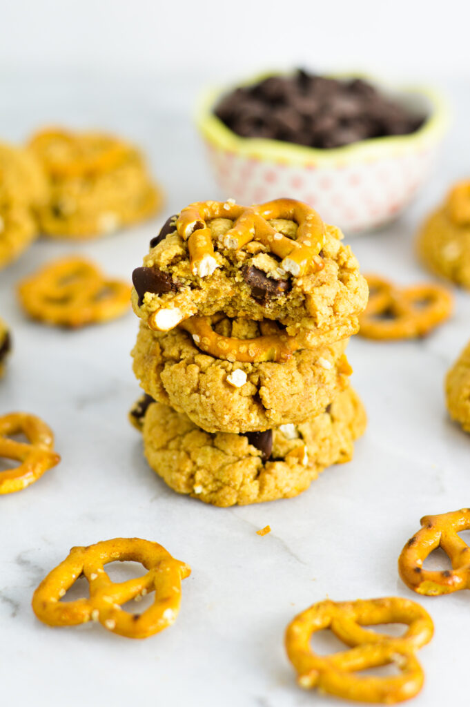 A small stack of Chubby Hubby Cookies with a bite taken out of the top cookie.