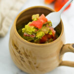 A fork with some Strawberry Matcha Mug Cake on it.