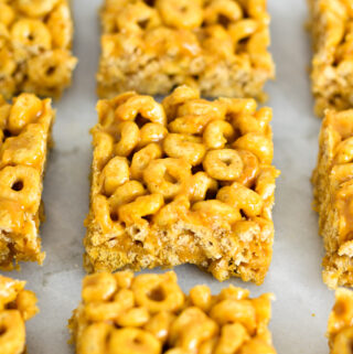 Peanut Butter Cheerio Bars on a granite surface.