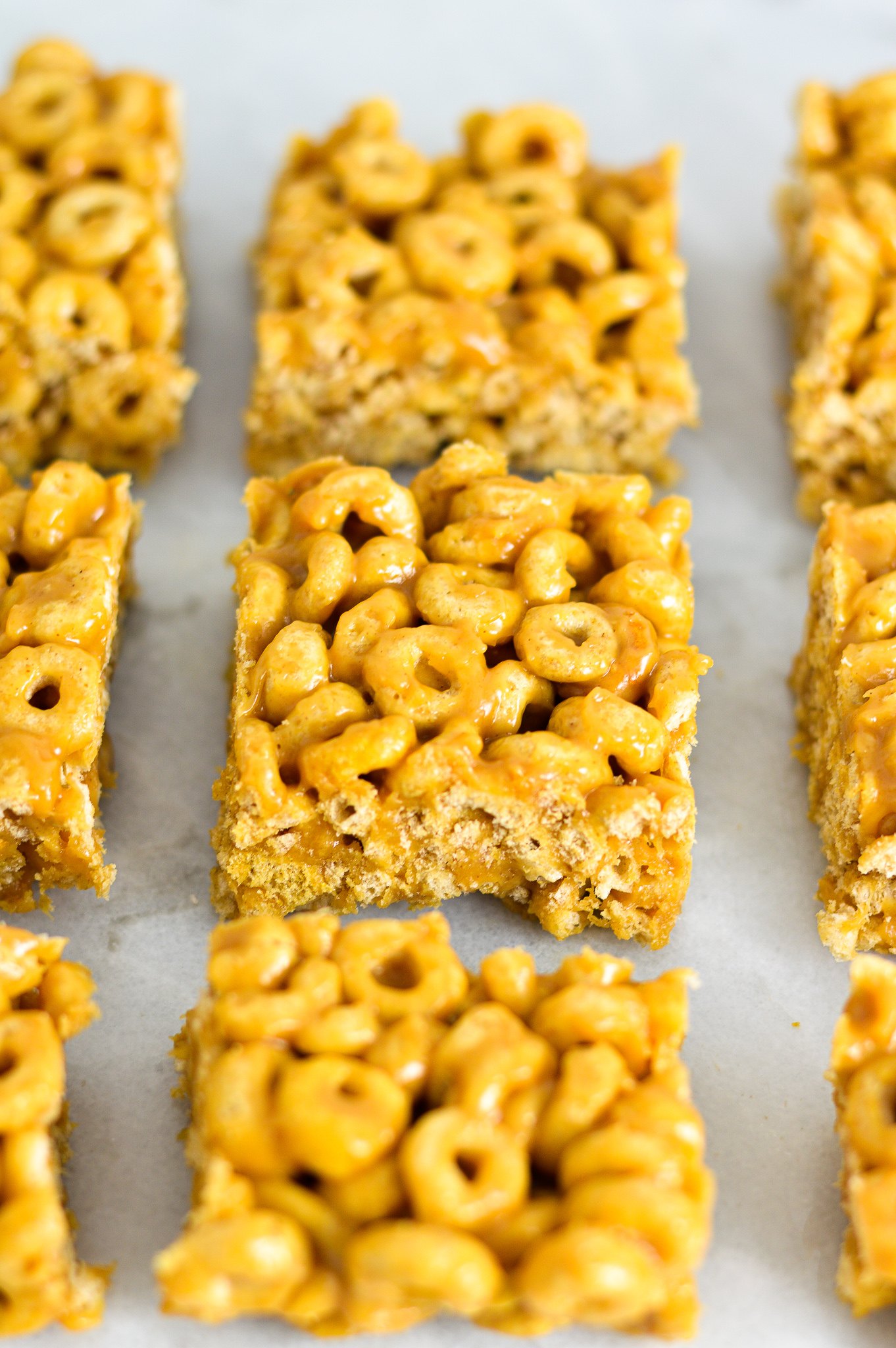 Peanut Butter Cheerio Bars on a granite surface.