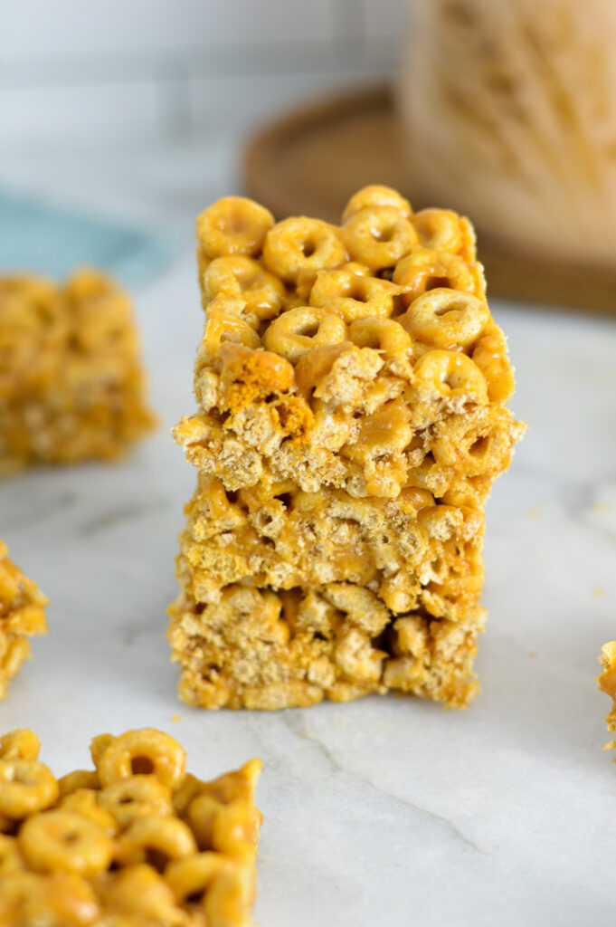 A stack of three Peanut Butter Cheerio Bars.