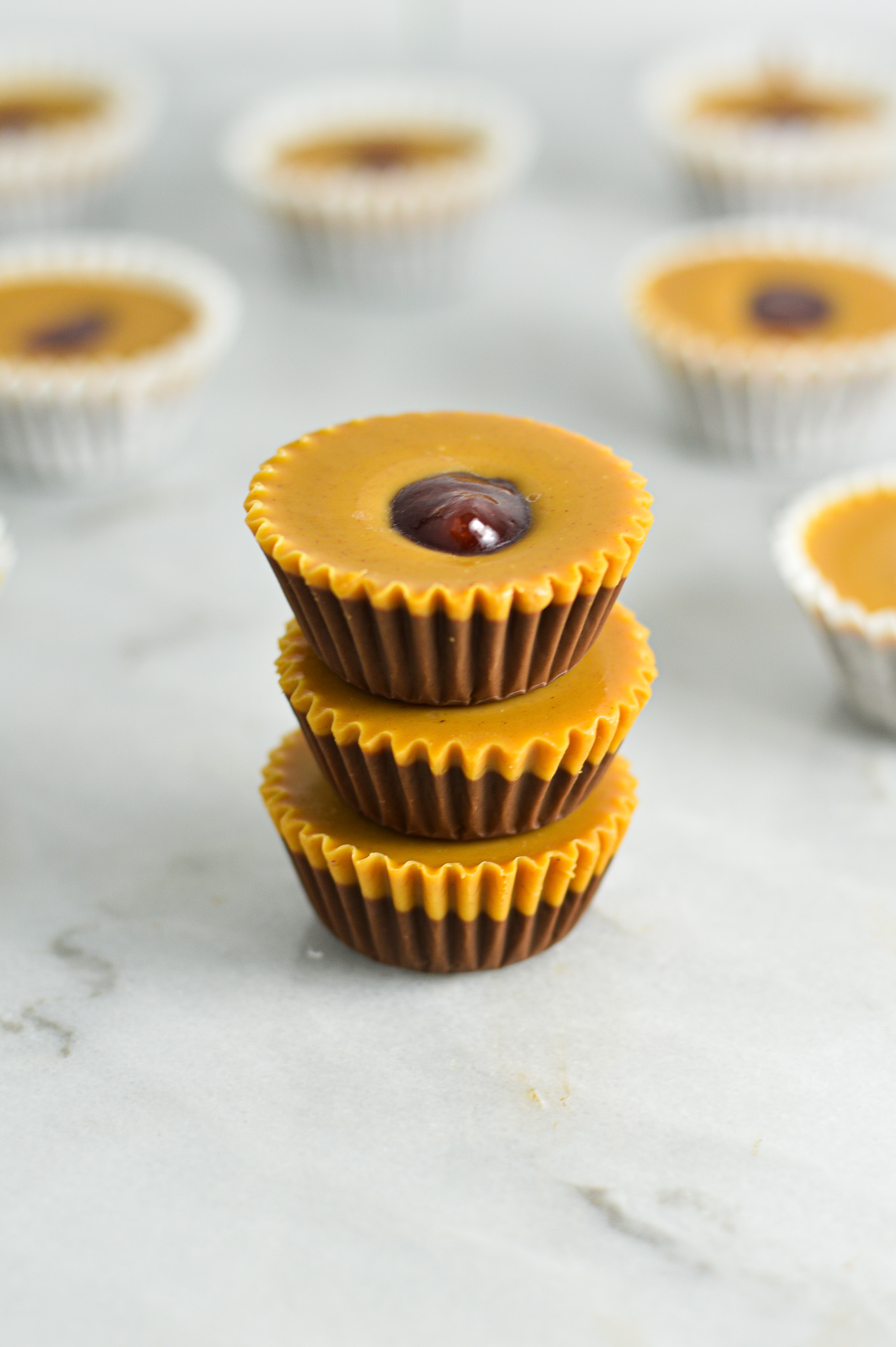 A stack of creamy Peanut Butter and Jelly Nutella Cups.