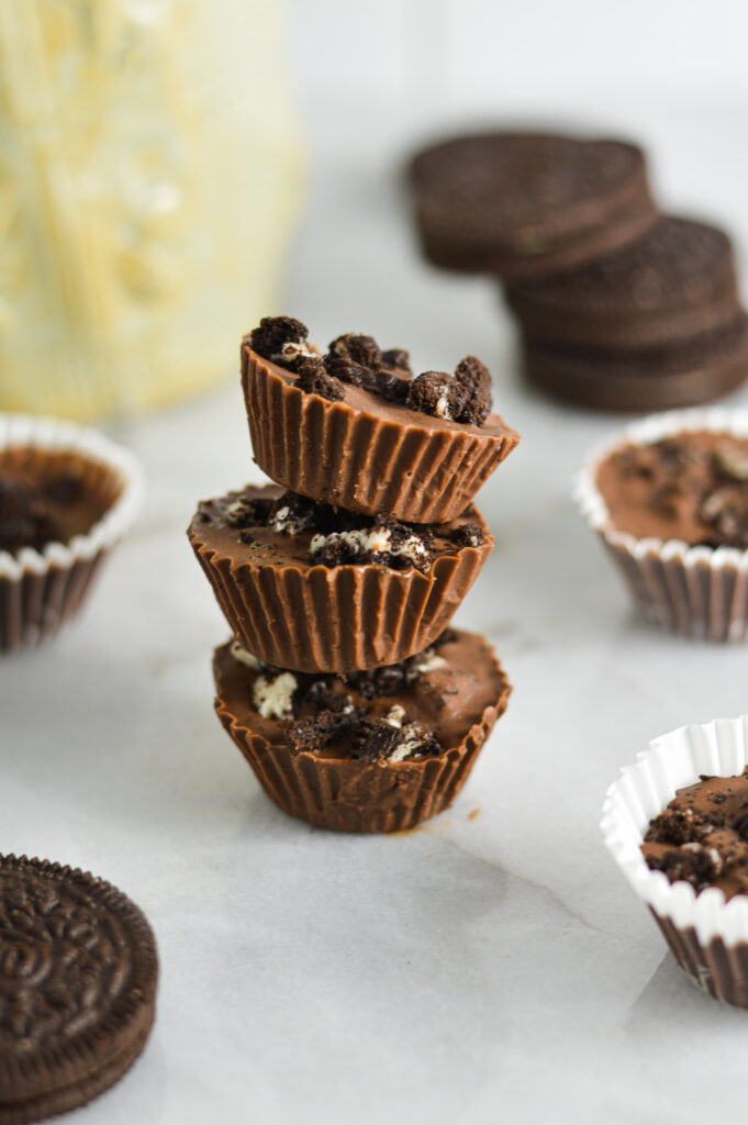 Three Mini Oreo Nutella Cups stacked with the paper liners removed.