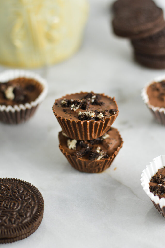 A stack of two Mini Oreo Nutella Cups with crushed Oreos on top.