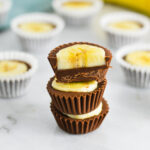 A stack of Banana Nutella Cups with the top Nutella Banana cup cut in half.