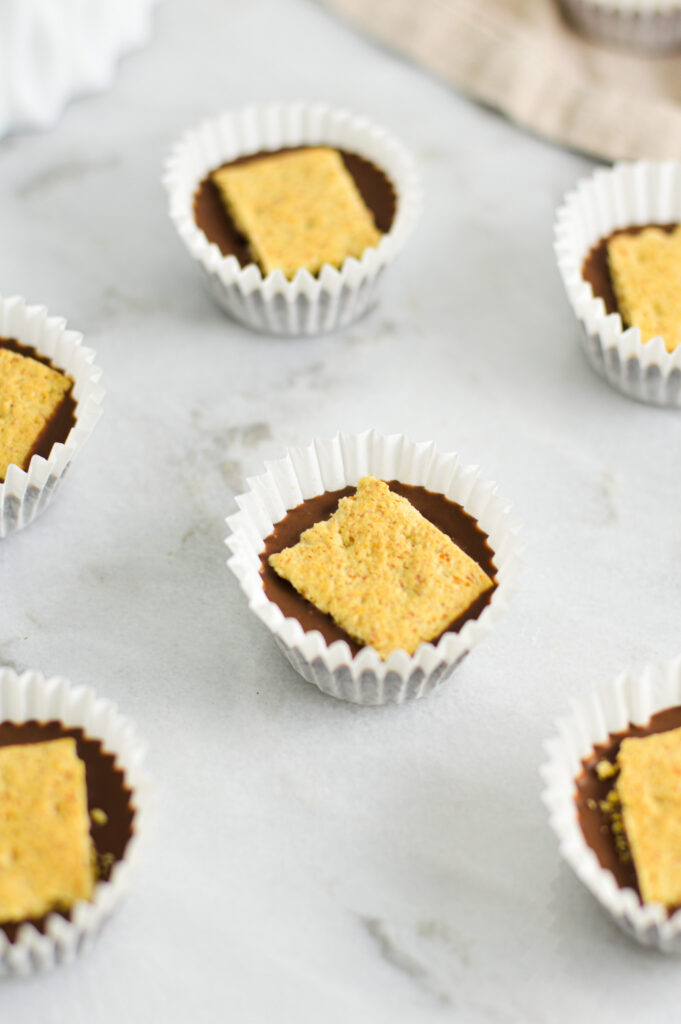 Rich, chocolatey Graham Cracker Nutella Cups on a granite surface.