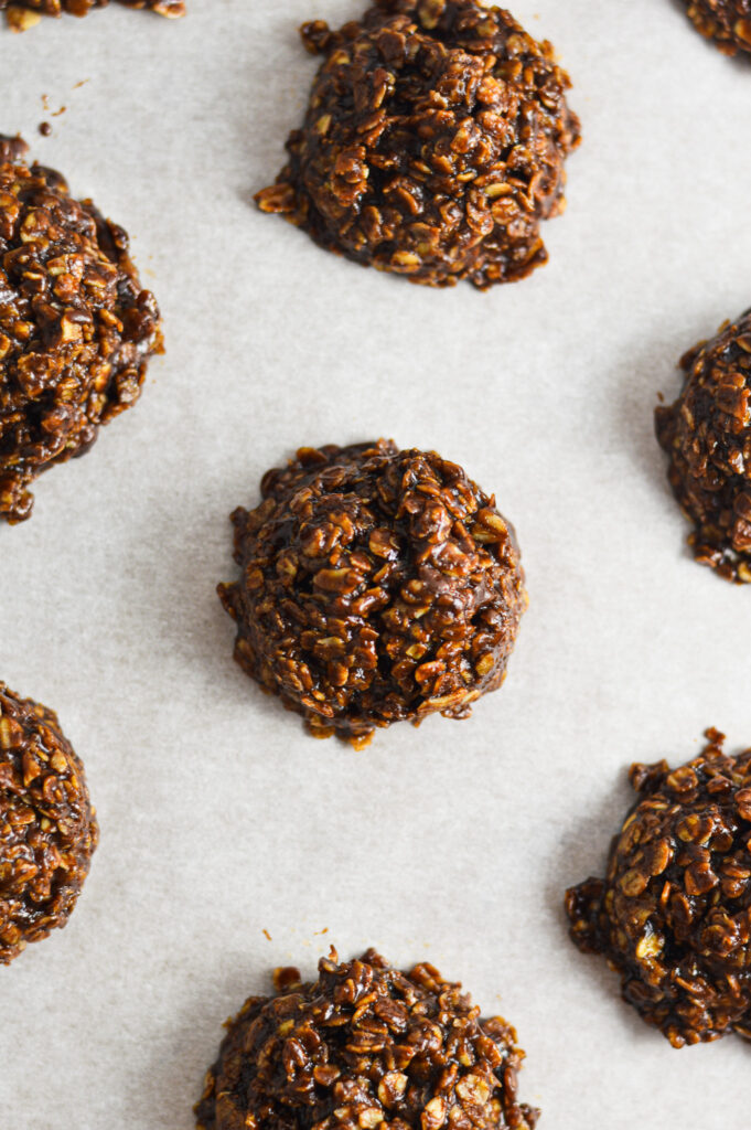 No Bake Nutella Oatmeal Cookies on a parchment paper lined baking sheet.