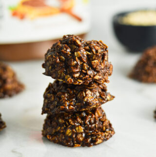 A stack of No Bake Nutella Oatmeal Cookies on a granite surface.