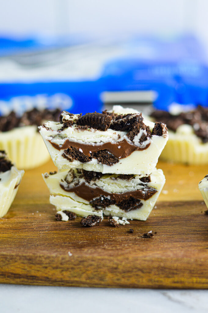 Nutella Stuffed Oreo Cups cut in half showing the creamy Nutella center.