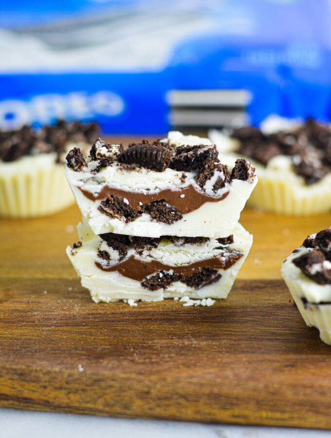 Nutella Stuffed Oreo Cups topped with crushed Oreo cookies.