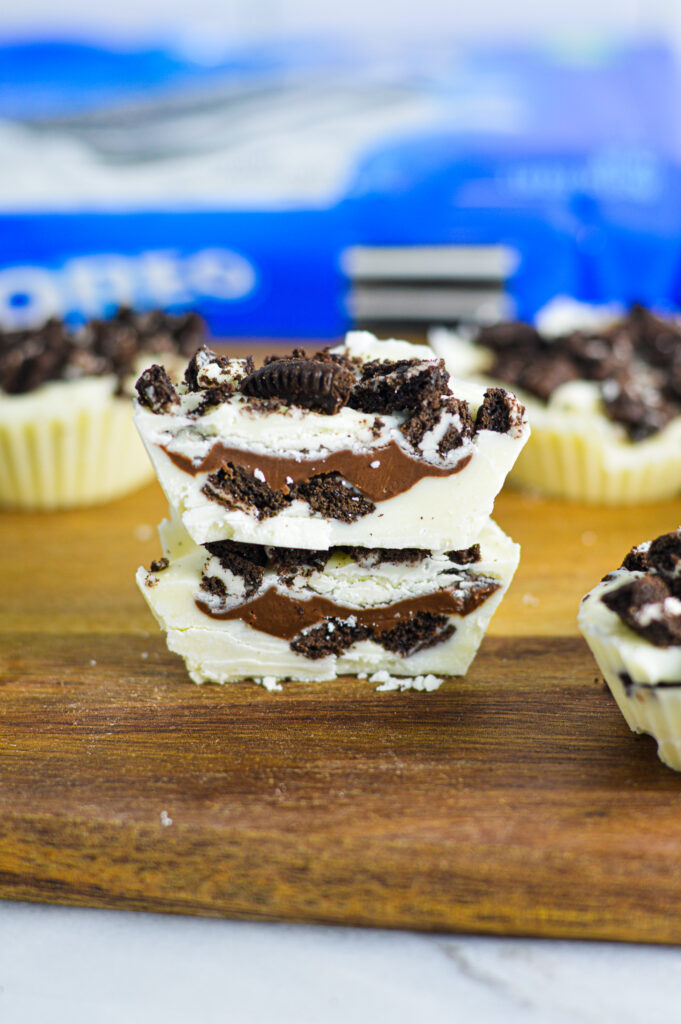 Nutella Stuffed Oreo Cups topped with crushed Oreo cookies.