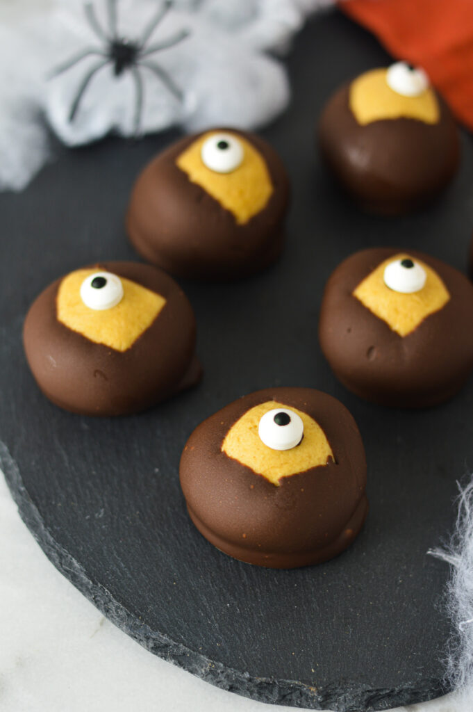 A spooky take on traditional Buckeyes, these Eyeball Buckeyes feature a candy eyeball and a chocolate dipped exterior.